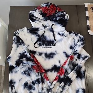 Young and reckless hoodie with rose decal.